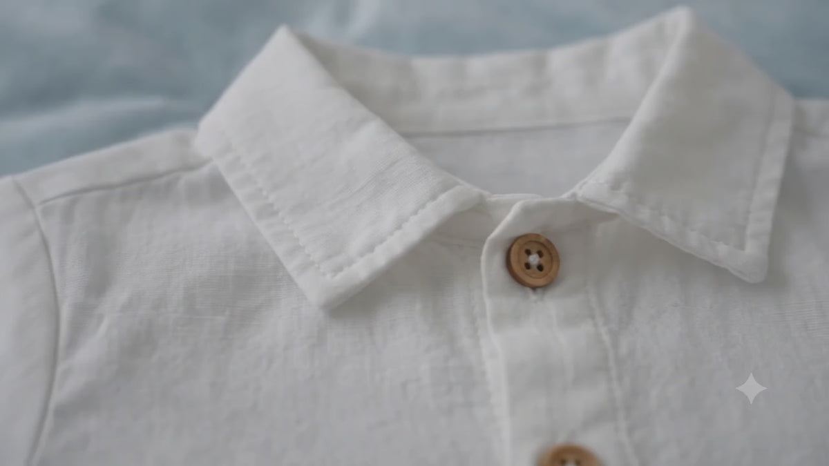 Baby boy white first birthday outfit with button shirt and matching shorts